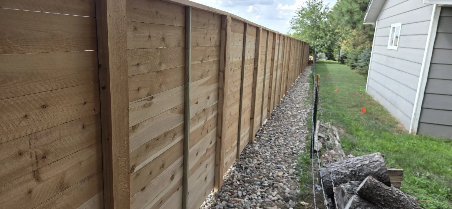 Back view of the Sioux Falls horizontal cedar fence showing its posts and supports