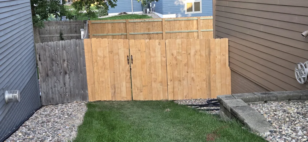 Wood fence and entrance built by EZ Elite Fence