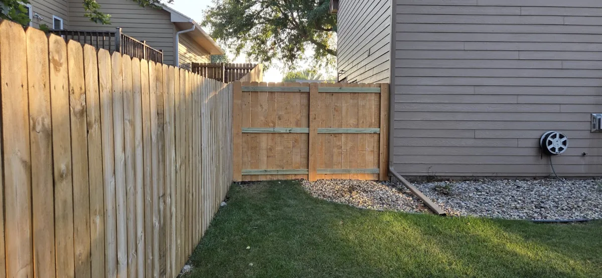 Wood fence and gate along a side yard